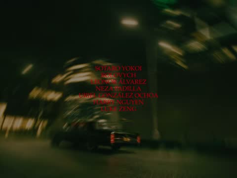RUINAS, frame 16: end credits over a blurred night street
